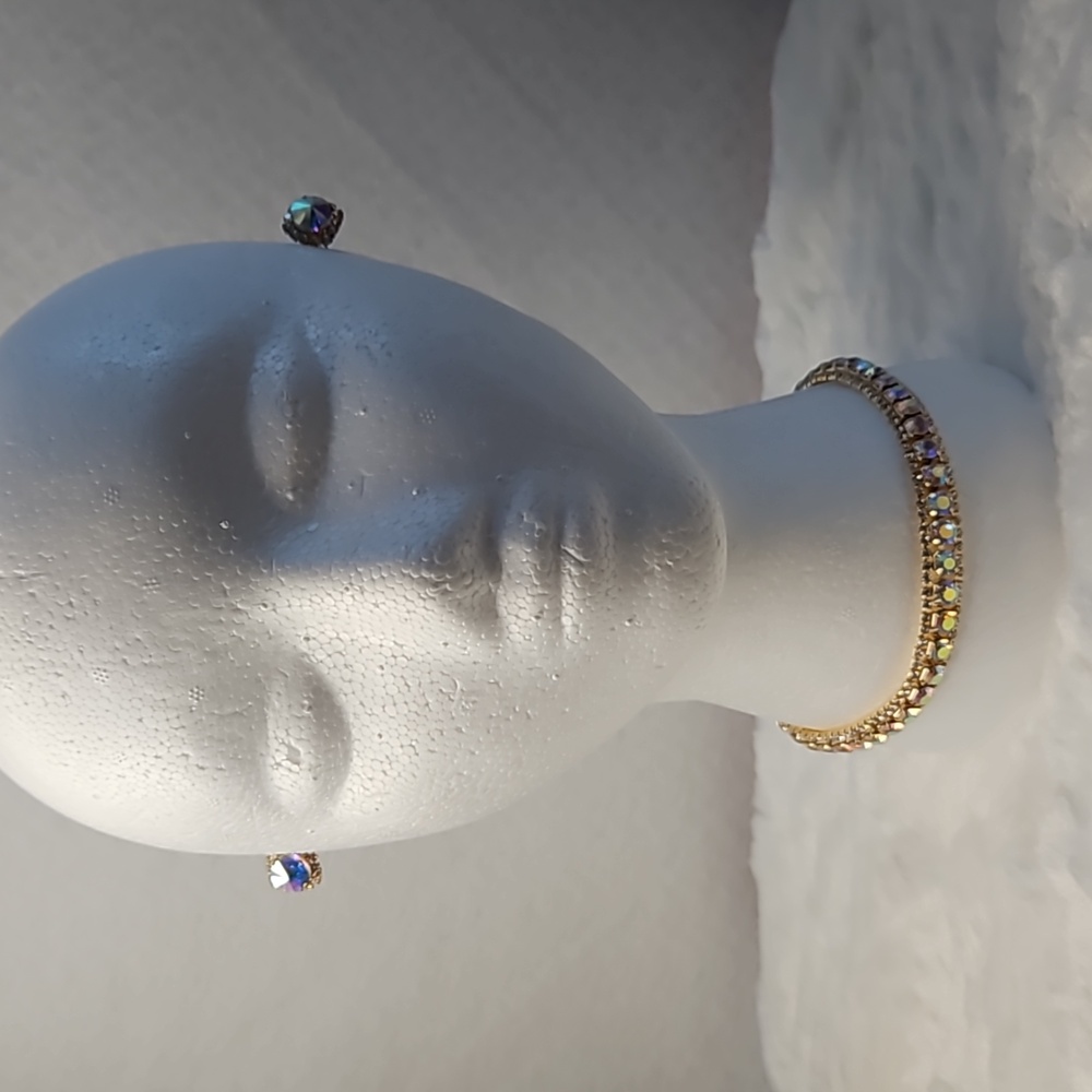 Brand New womens gold and rinestone 3 piece choker necklace and ear rings set.